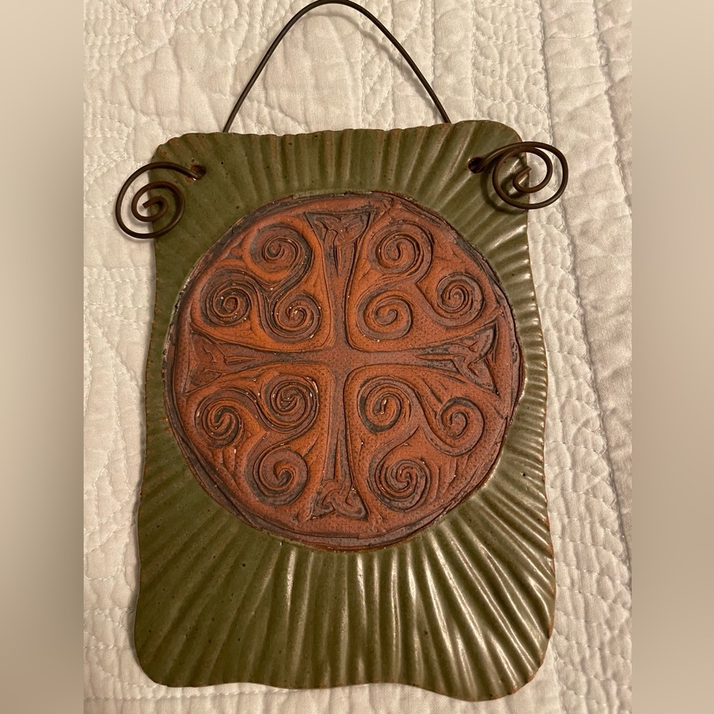 Nice little pottery wall art signed “Judy 06”